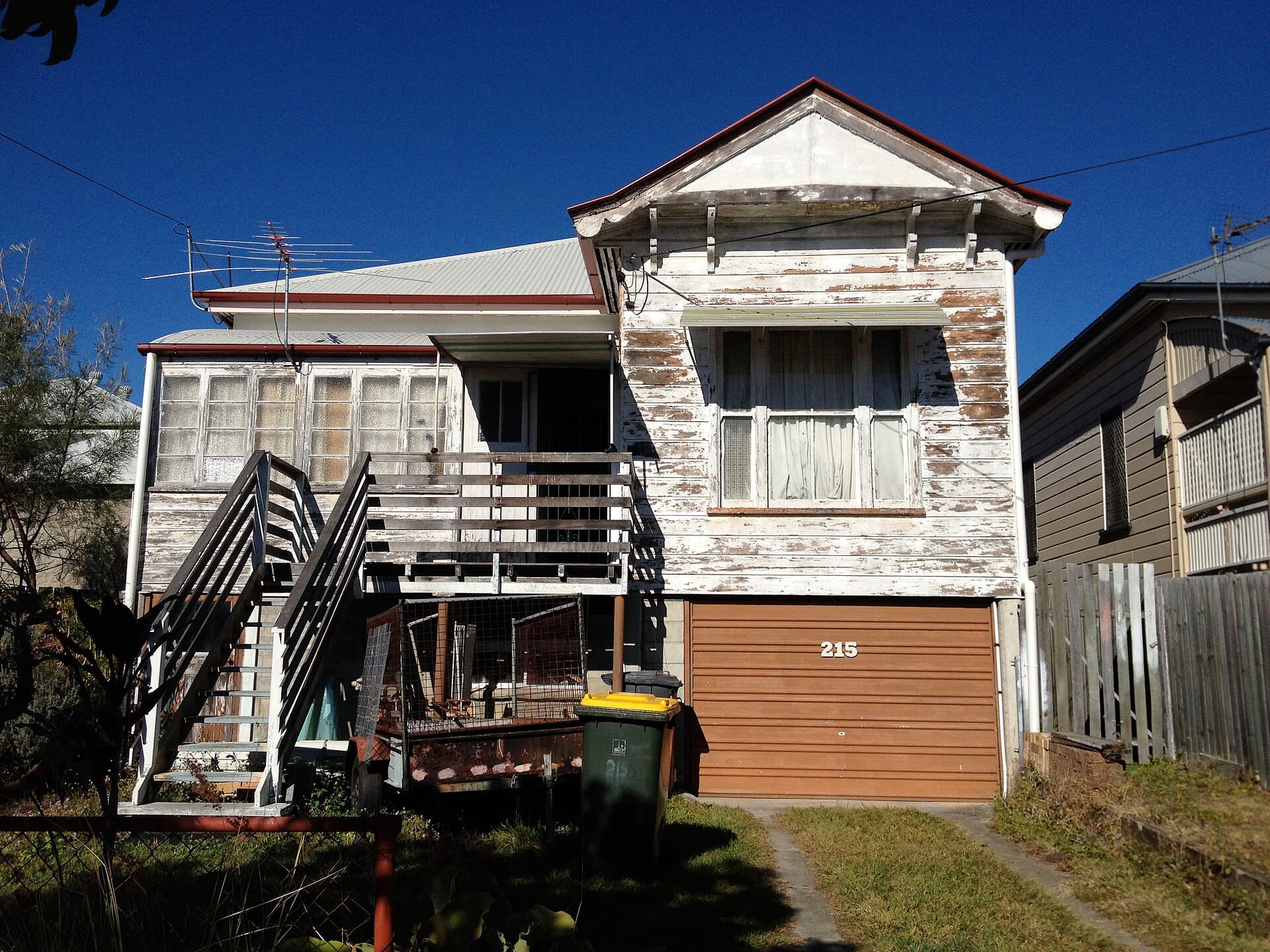 A timber Queenslander in New Farm, where additions, verandah roofs and old chimneys create the leak paths that a new membrane is often blamed for and rarely caused.